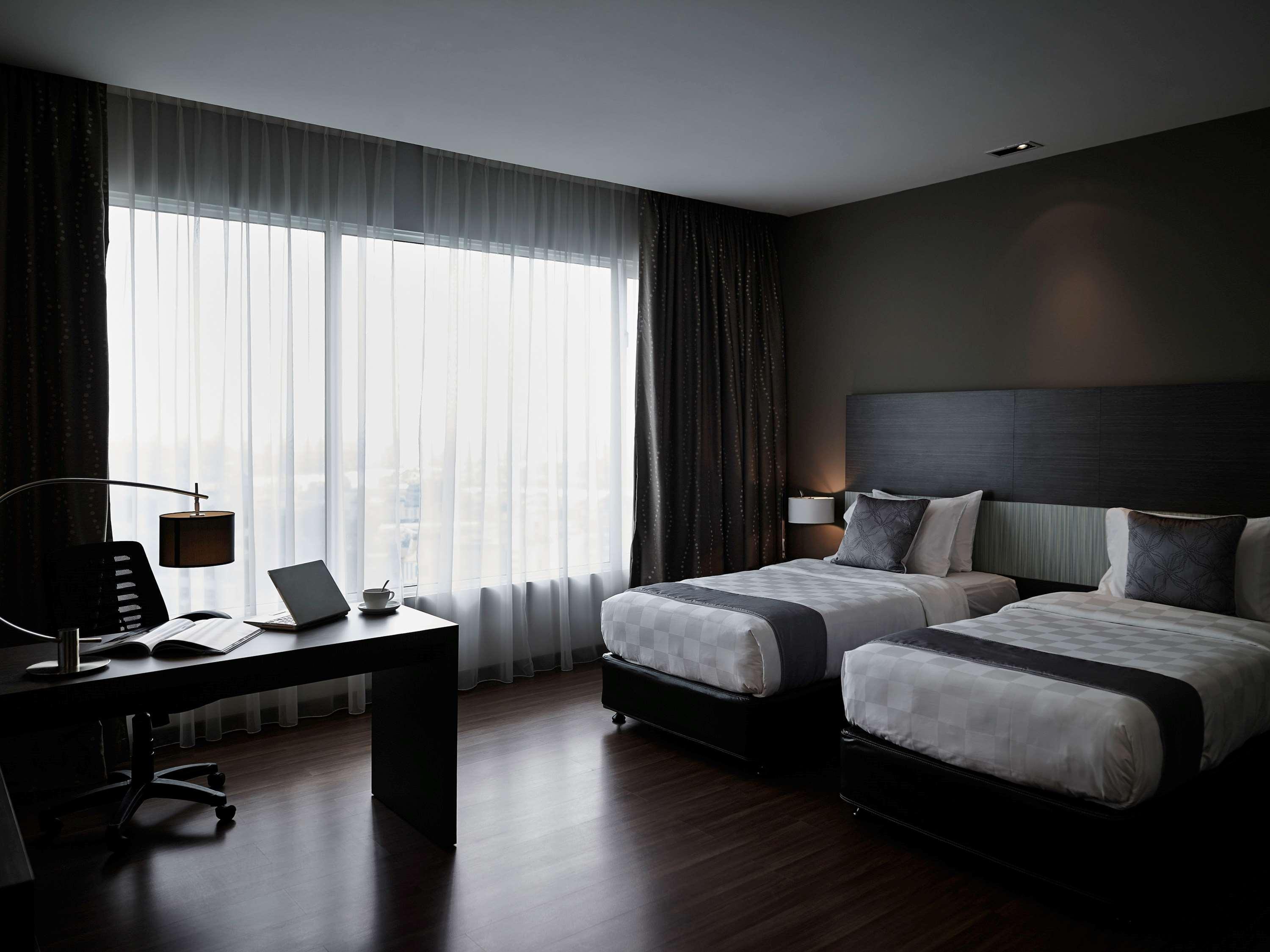 Hotel Pullman Kuching Extérieur photo Deluxe Room