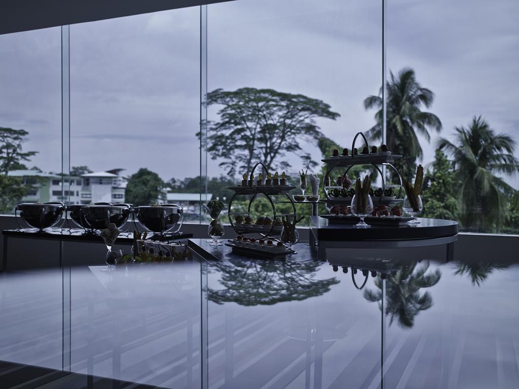 Hotel Pullman Kuching Extérieur photo The interior of the National Museum of Singapore