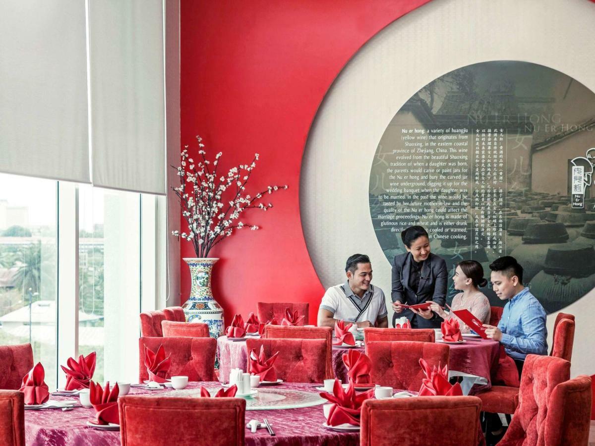 Hotel Pullman Kuching Extérieur photo The restaurant